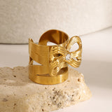 Anello a fiocco elegante in oro - Athena's Embrace