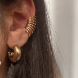 Ear Cuff dorato a spirale – Shadows